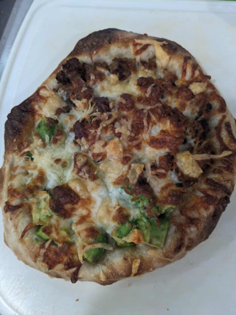 the raven boys half sasusage half avocado pizza gansey
